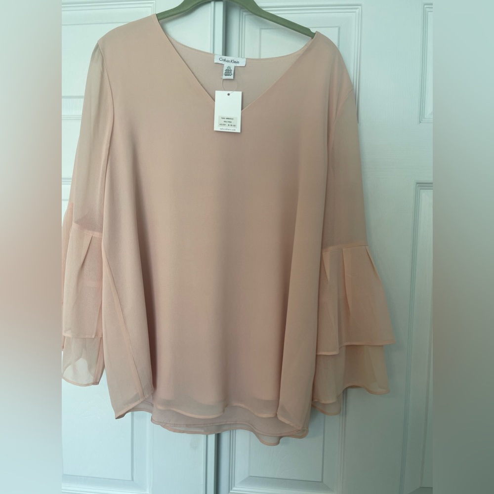Calvin Klein peach ladies blouse size L Only worn once.
